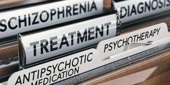 Photo of files representing treatment of psychotic disorders.